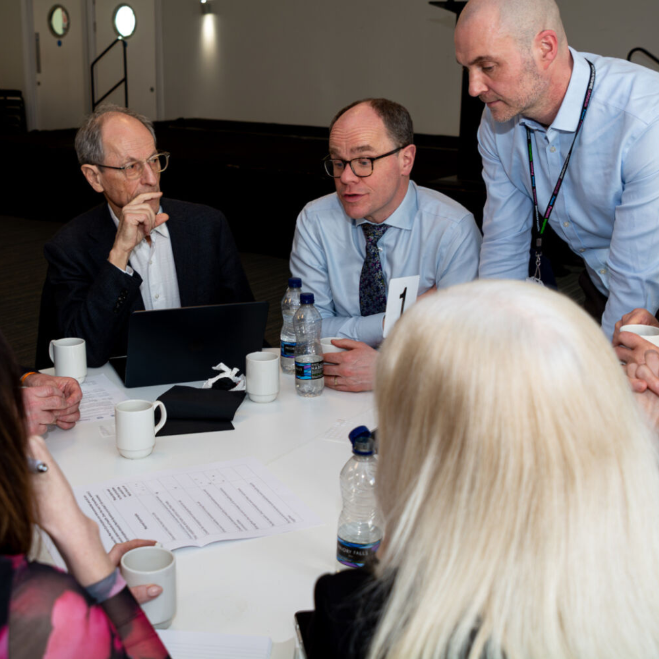 Sam Anson and attendees having a round-table discussion at the CHES launch in Saltcoats Town Hall
