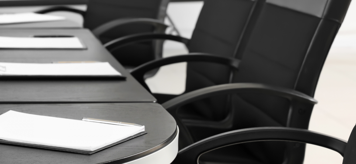 Corporate meeting room with chairs and table