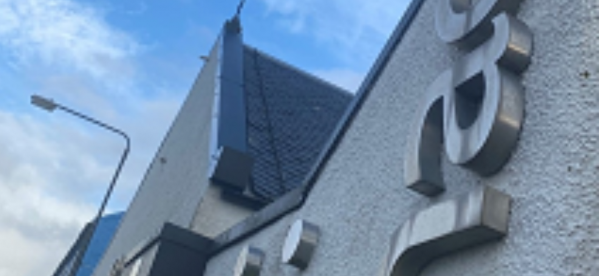 Harbour Arts Centre exterior with Next Take logo