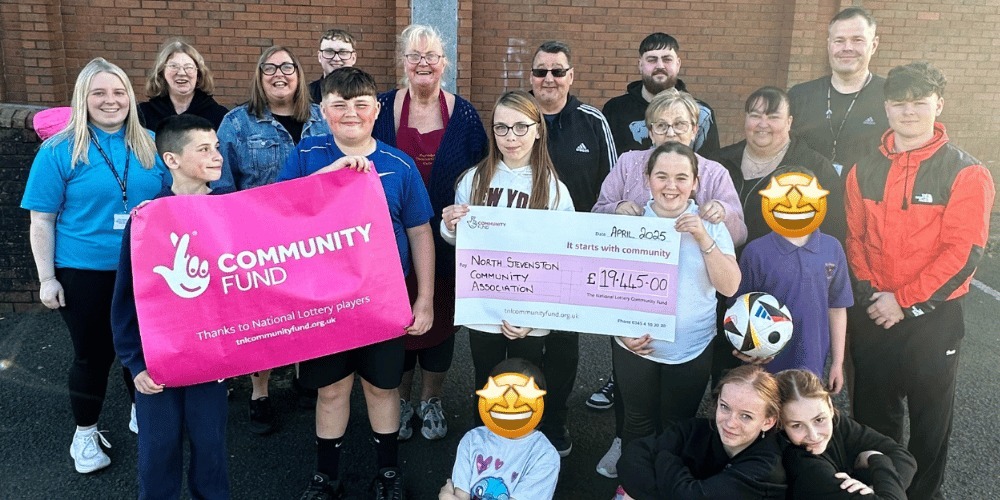 Hayocks Community Association young people with cheque