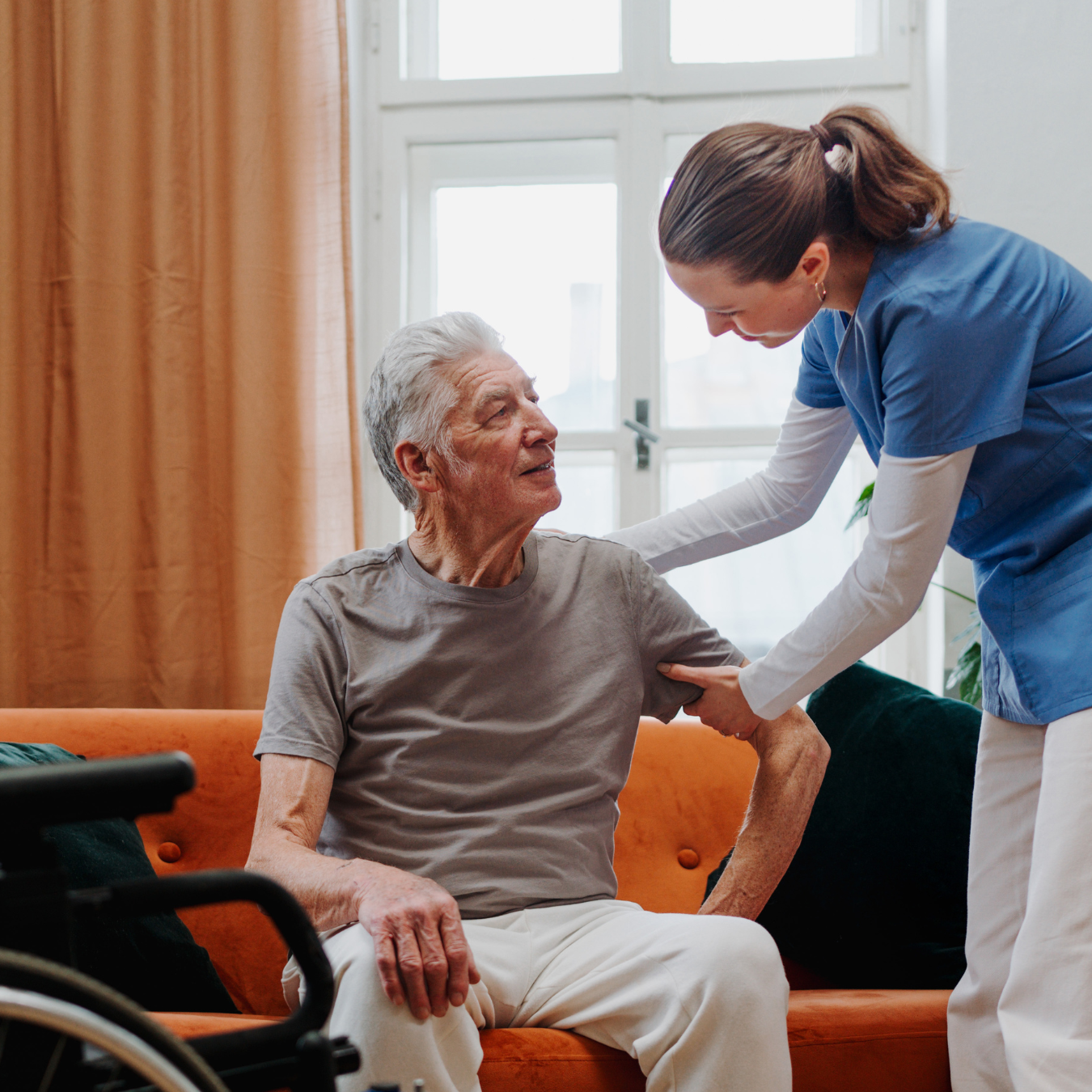 Wheelchair user patient and carer standing up from seat (1)