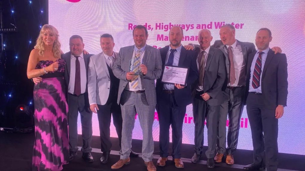 The Roads team on stage collecting their award at the APSE prizegiving