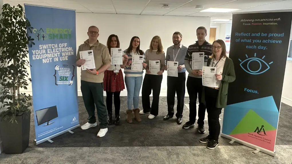 Group photo of climate champions holding certificates
