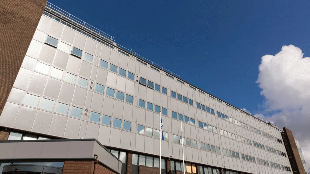 Office block on a sunny day with cloud in the background