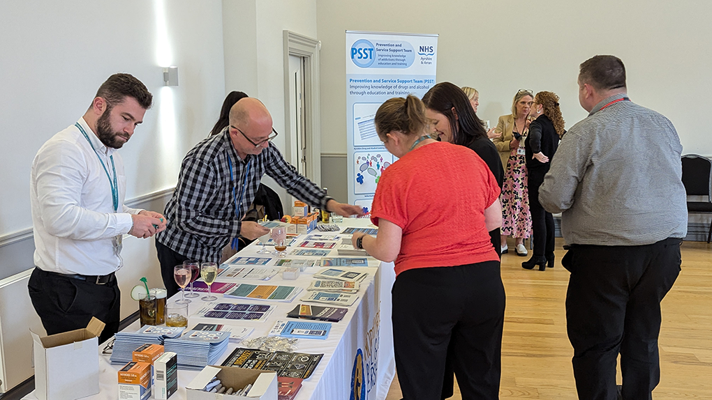 Alcohol and Drug Partnership team at a question and answer stall at the connected leadership event